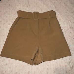 Bobbles and Lace boutique tan trouser shorts with detachable belt